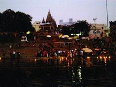 Assi ghat with Laxmi Narayan temple and pilgrims performing morning rituals