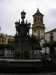 Plaza Alta de Algeciras with central fountain and Church of Nuestra Señora de la Palma