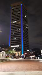 Baltimore World Trade Center lit up in blue