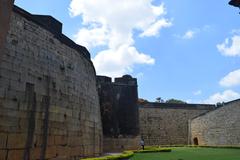 Bangalore Fort in ruins, with stone walls and archways