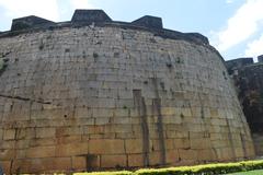 Bangalore Fort's main gate with surrounding greenery