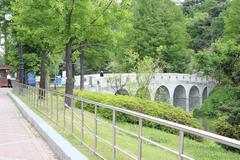 bridge near the Gate of Peace leading to Mongchontoseong in a plaza