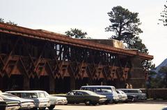 Cars parked outside Mission 66 building in Rocky Mountain National Park