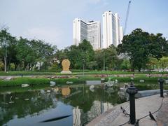 scenic view of Banjasiri Park with a water fountain and modern buildings