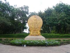 Benjasiri Park scenic view with flower beds and a pond