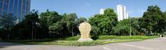 Banjasiri Park, urban green space in Bangkok, with trees, ponds, and walking paths