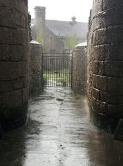 corridor between cellblocks 5 and 6 at Eastern State Penitentiary on a rainy day