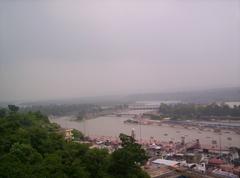 View of Rishikesh with the Ganges River and mountains in the background