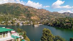 Scenic view of Bhimtal Lake surrounded by lush green hills