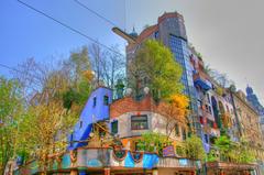 Colorful painting by Friedensreich Hundertwasser with wavy lines and bright geometric shapes