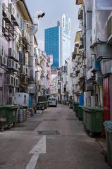 Alley behind Boat Quay in Singapore with modern skyscrapers in the background