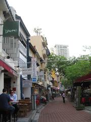 Boat Quay in Singapore with waterfront buildings and outdoor seating