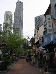 Scenic view of Boat Quay in Singapore with historic buildings and restaurants along the Singapore River at dusk