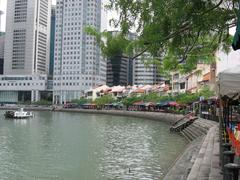 Scenic view of Boat Quay in Singapore with historic buildings and waterfront promenade