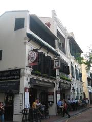 Boat Quay in Singapore along the Singapore River with colorful historical shophouses