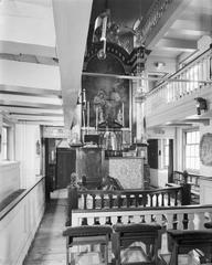 Interior view of the main altar with pulpit in Amsterdam's rijksmonument number 6107