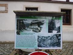 Information board at Lochmühle in Oberwartha with historical details in German