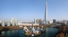 Lotte World amusement park with skyscrapers in the background