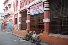 group of beggars resting in barrack in Calcutta