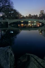 Bow Bridge in Central Park with reflection on water