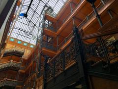 Bradbury Building interior with sunlight streaming through the ornate ironwork