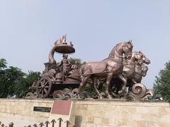 Shri Krishna and Arjuna on a chariot in the Mahabharata war