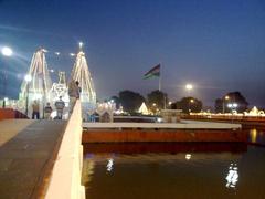 Night view of Bramha Sarovar with main temple and Indian National flag in Kurukshetra