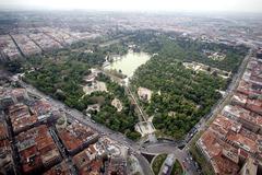 Retiro Park on a windy and rainy Saturday with orange alert level and environmental workers evaluating trees