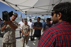 Lance Cpl. James Brown of 3rd Low Altitude Air Defense Battalion explains the FIM-92A Stinger missile to San Diego residents during Fleet Week