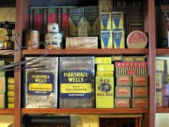 paint and turpentine bottles in a general store