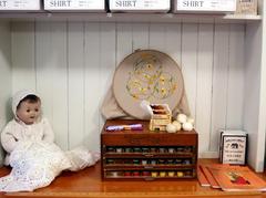 variety of sewing supplies on a wooden table