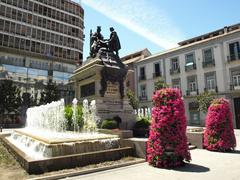 Statue of Isabella the Catholic receiving Christopher Columbus in Plaza Isabel la Católica, Granada