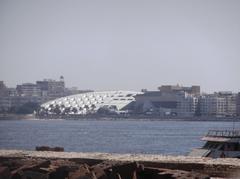 Alexandria beach from Qaitbay Citadel with Bibliotheca Alexandrina in the background