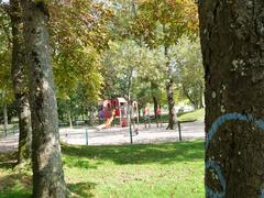 Jardin public de Marennes with outdoor play structures for children