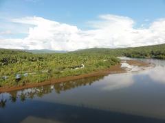 scenic view of Goa's hinterland with lush green fields and hills under a clear blue sky