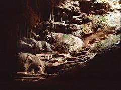 self-portrait of Archedemos the Nympholept with steps carved in stone, leading to a cave entrance