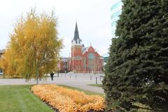 Central Memorial Park in Calgary during fall with First Baptist Church in the background