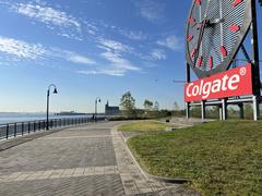 Colgate Clock in Jersey City on October 7, 2022, with Central Railroad of New Jersey Terminal and Statue of Liberty in the background