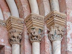 Romanesque columns and capitals of the upper chapel portal in the courtyard of honor at the Palace of the Kings of Majorca in Perpignan