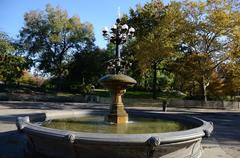 Cherry Hill Fountain in Central Park with frosted glass lamps and golden spire