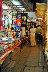 Night Bazaar area on Chang Klan Road with various shops and products in Thailand