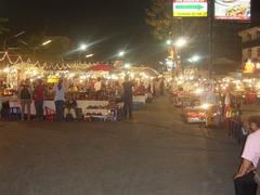 Open-air section of the Chiang Mai night bazaar in a town square