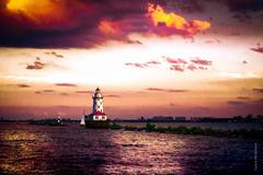 Chicago Harbor Lighthouse at sunrise with colorful sky