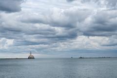 Chicago Harbor Lighthouse with the city skyline in the background