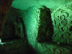 Carvings in Chislehurst Caves