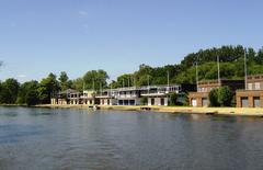 Oxford University College boathouses by the river