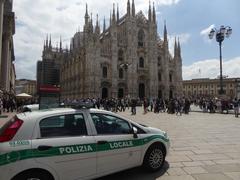 Duomo and police car in Piazza del Duomo, Milan