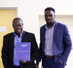 Daniel Lubangakene Otto with his uncle at the launch of 'Acholi Dictionary'