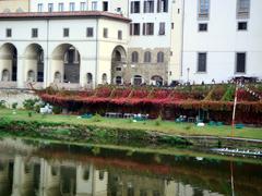 View of Lungarno in Florence along the Arno river in front of Uffizi Gallery