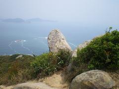 Scenic view of Clearwater Bay Country Park with lush green hills and a tranquil bay